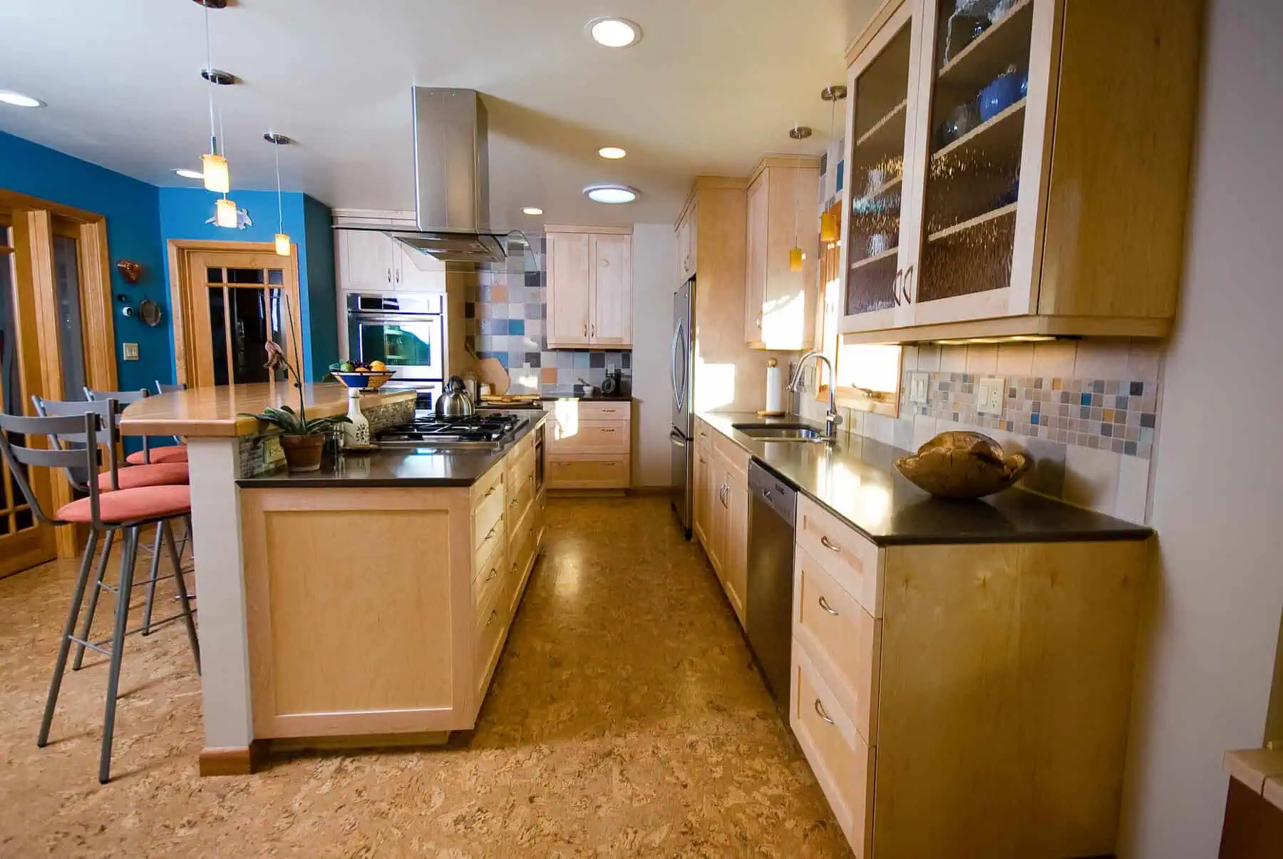 Modern kitchen with light wood cabinetry