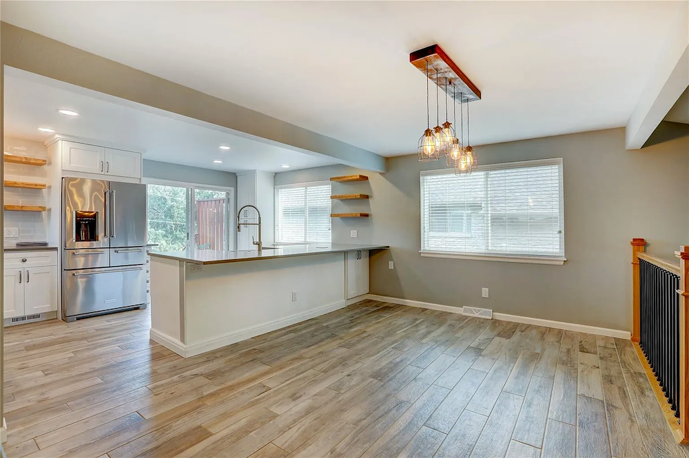 Modern kitchen with wooden flooring