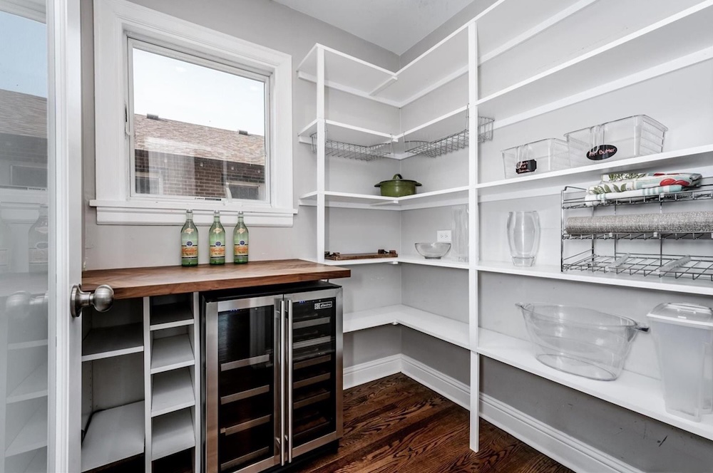 Empty pantry with white shelves
